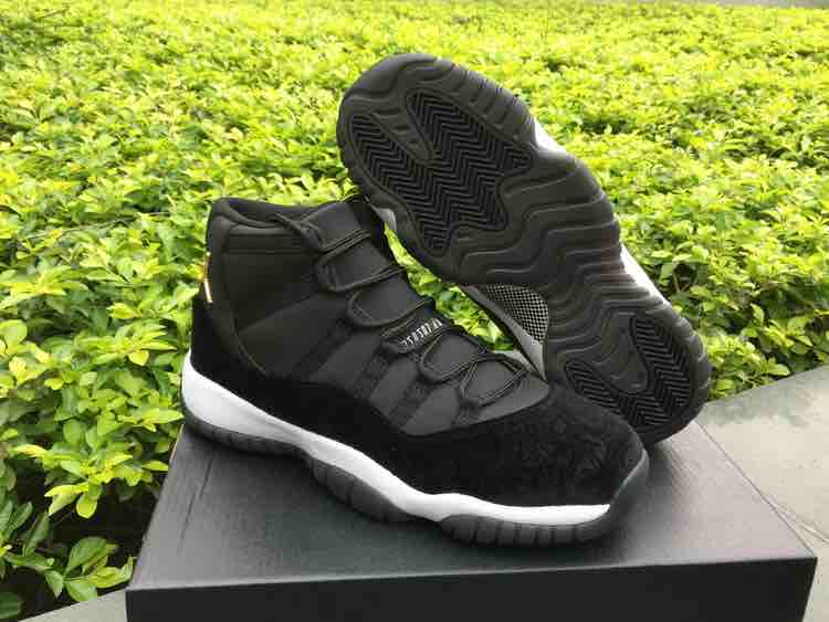 Nike Air Jordan 11 Black Gold Sneakers